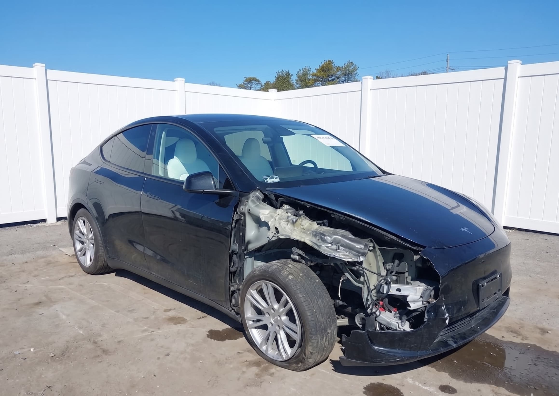 2024 Tesla Model Y LR with front-end accident damage